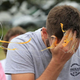 Person smashing an egg against their face, with the yolk flying everywhere